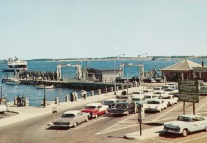 Cars wait in line at East Ferry to board the incoming ferryboat to Newport in the 1960s. The ferry, aside from driving through Providence, was the only way to get to Aquidneck Island until 1969.