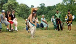 Everett “Tall Oak” Weeden, a descendent of a Jamestown family, second from right, observes a tribal dance during a Narragansett Nickommo in September 1960. Weeden, now 85, continues to participate in annual Nickommos as a tribal elder. (Photo courtesy of Tomaquog Museum.)