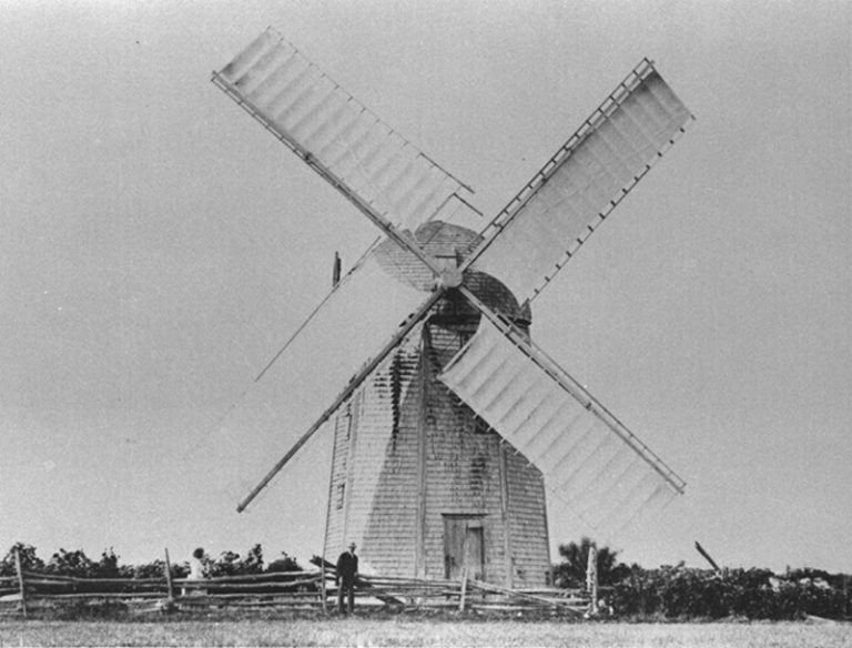 Windmill with sails, early view, photo may have been taken before mill ceased operation. Placed on the National Register of Historical Places on March 14, 1973.